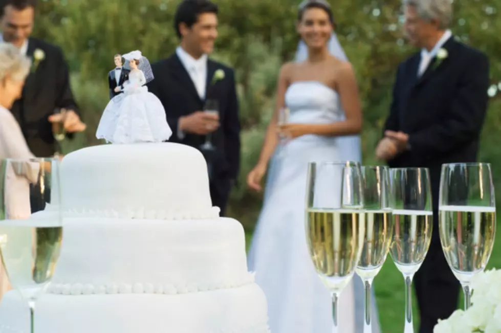 Wedding DJ Leaves West Michigan Couple Standing On the Dance Floor